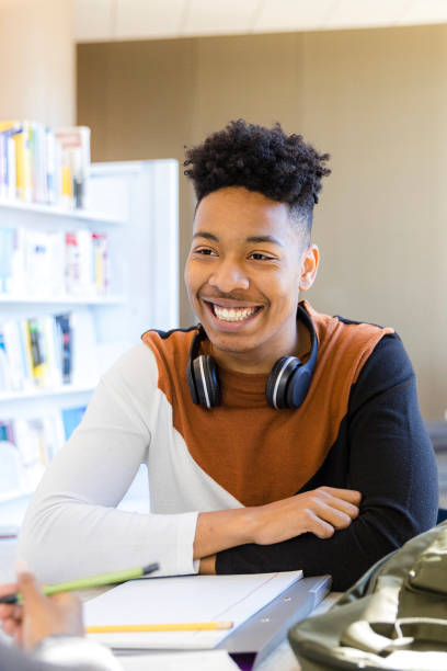 istock Happy Young Male Student Smiling in Classroom, Studying 2199176517