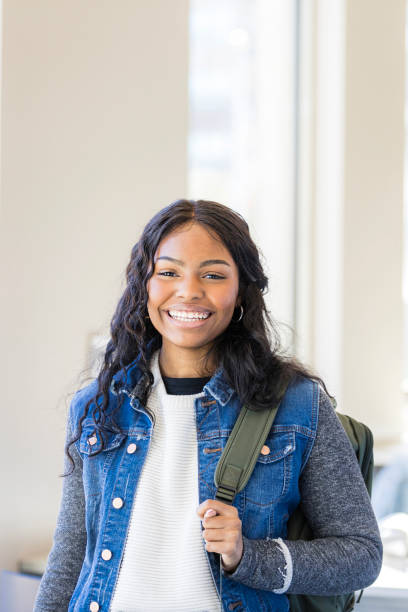 istock Happy Young Woman Student with Backpack, Toothy Smile 2199176547