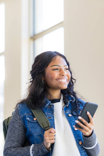 istock Happy Young Woman Using Smartphone, Casual Style 2199176555