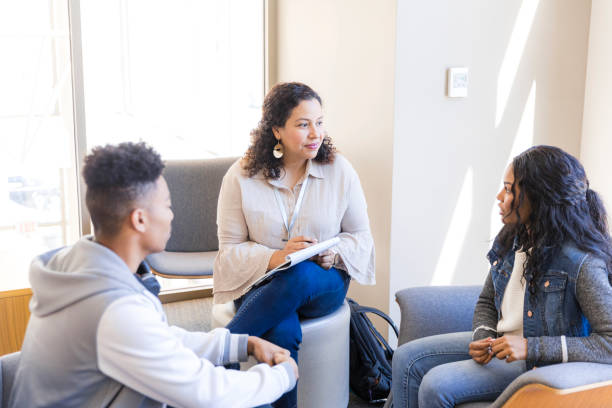 istock Group Therapy Session: Diverse Young Adults Discussing Mental Health 2199176582