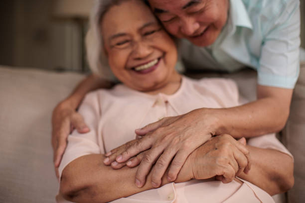 istock Senior Thai Couple Sharing a Tender Moment 2199181415