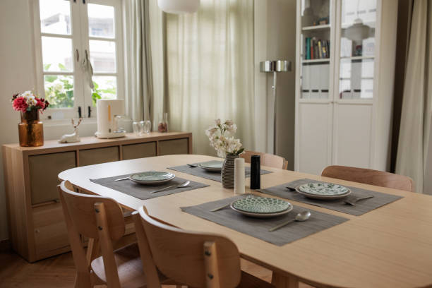 istock Stylish Place Setting on Wooden Dining Table in Modern Room 2199183170