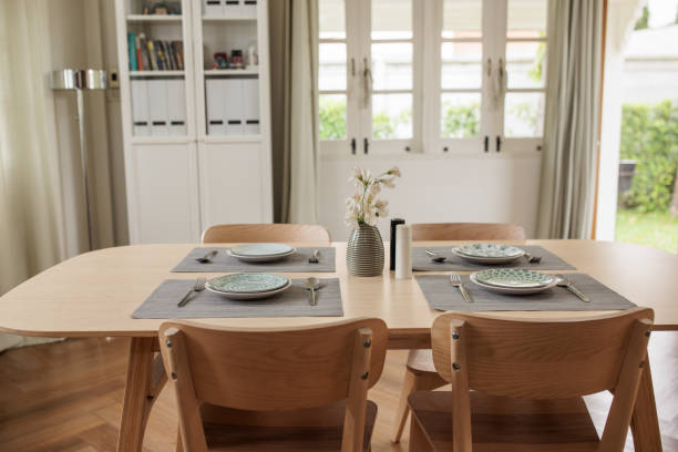 istock Stylish Place Setting on Wooden Dining Table in Modern Room 2199183192