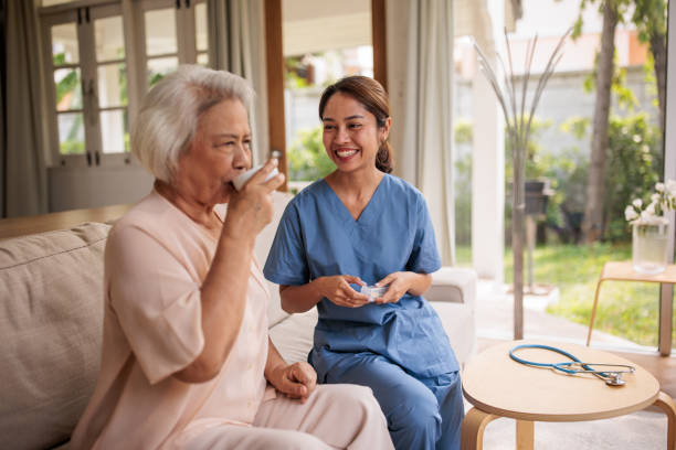istock Senior Thai Woman Taking Medicine 2199183311