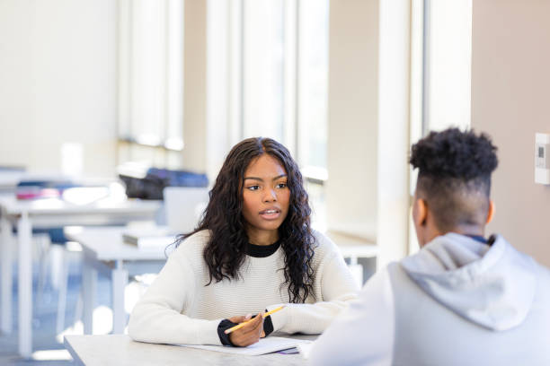 istock African American Students Discussing Ideas in Classroom 2199184273
