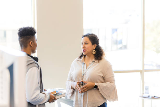 istock Female professor mentoring a student, casual discussion 2199184299