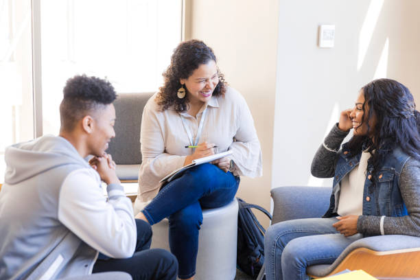 istock Group Therapy Session: Diverse Young Adults Discussing Mental Health 2199184339