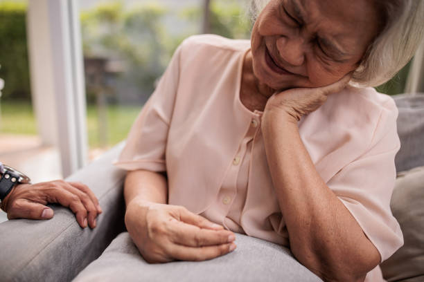 istock Elderly Woman Experiencing Neck Pain 2199184506