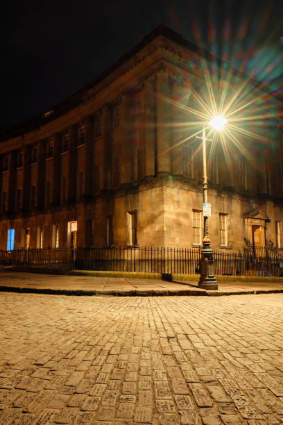 istock The royal crescent illuminated at night in bath, england 2199191523