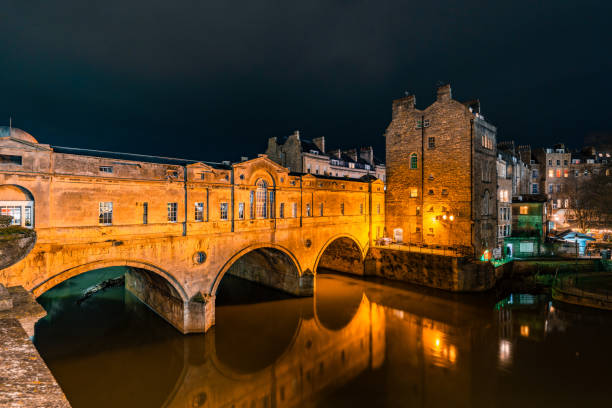 istock Pulteney bridge reflecting in the avon river at night in bath, england 2199204854