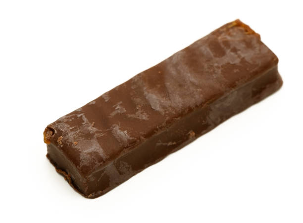 istock Delightful chocolate bar resting on a clean surface showcasing its smooth texture and rich color 2199211800