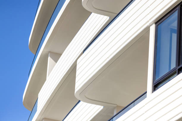 istock Closeup brand new modern apartment building, background with copy space 2199221844