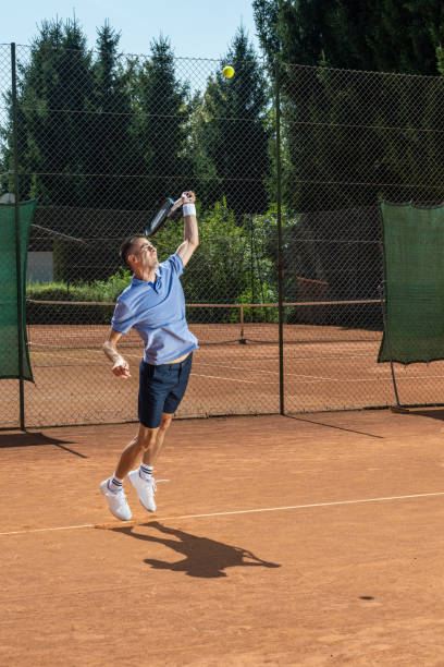 istock Determined Caucasian Male Tennis Player in Motion 2199246742