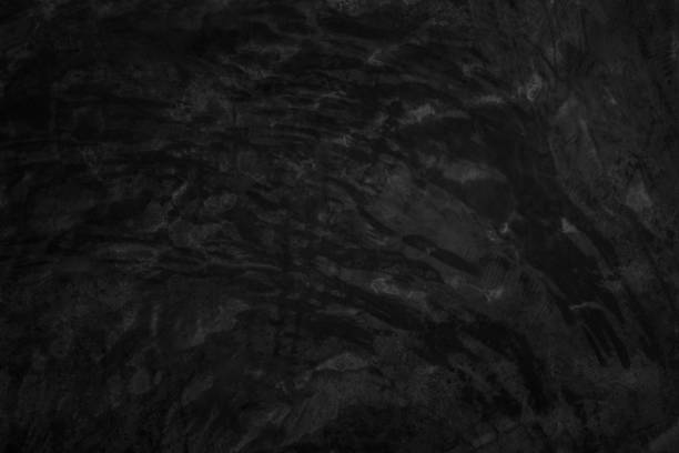 istock Black dark concrete wall background. Pattern board cement texture grunge dirty scratched for show anthracite promote product urban floor and abstract paper design element decor. Blackboard blank. 2199246905
