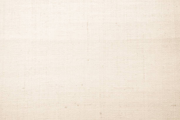 istock Brown sackcloth woven texture background in natural pattern. Jute hessian burlap, linen background in light beige cream color blank. Weaving canvas fiber line cotton cloth textured as organic. 2199247799