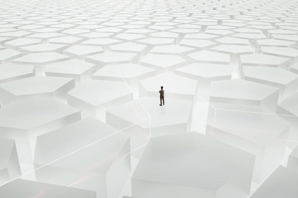istock Young man standing in abstract maze 2199265745