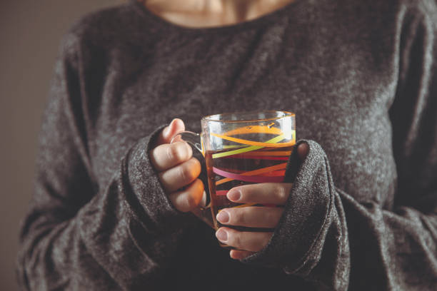 istock young girl drinking tea indoors 2199273414