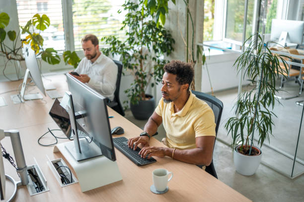 istock Mixed Race Corporate Male Employees At The Office 2199278396