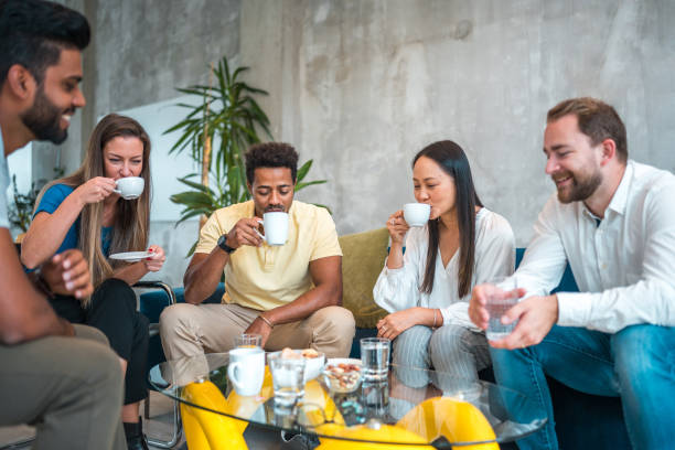 istock Multiethnic Team Socializing in Trendy Office 2199278402