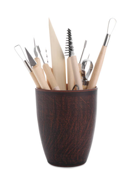 istock Set of different clay crafting tools in holder isolated on white 2199279237