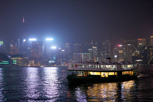 Hong Kong, China - December 5, 2023: a Star Ferry crossing Victoria Harbour. The Star Ferry is a passenger ferry service operator and a popular tourist attraction in Hong Kong.