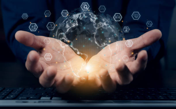 istock Hand holding virtual Global holography and virtual icon connecting metaverse. Digital technology and big data for analysis. Business connection application via technology internet worldwide. 2199285558