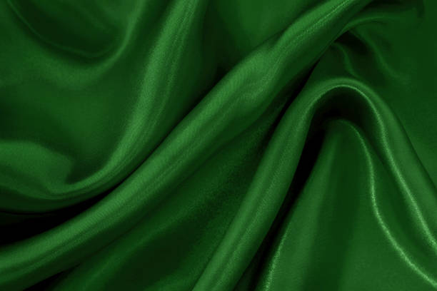 istock Dark green fabric cloth texture for background and design art work, beautiful crumpled pattern of silk or linen. 2199288788