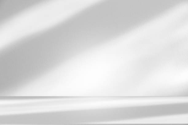 istock Wall interior background, studio and backdrops show products.with shadow from window color white . background for text insertion and presentation product 2199291232