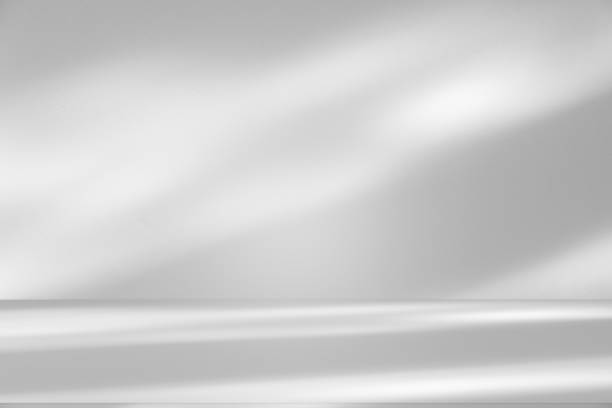 istock Wall interior background, studio and backdrops show products.with shadow from window color white . background for text insertion and presentation product 2199291251