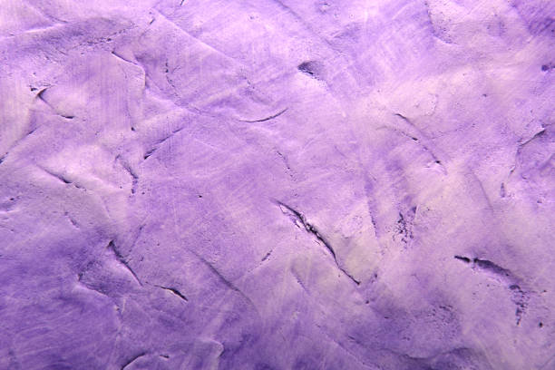 istock plaster background in light purple color with scuffs 2199292167