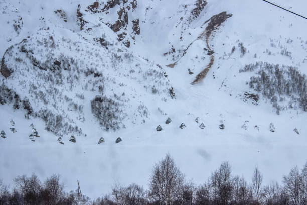 istock Winter Landscape with Forest and Mountain Peaks 2199293369