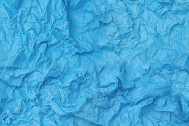 istock Blue wrinkled crumpled paper texture 2199296972