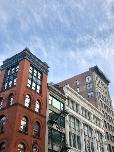 istock New York City SoHo loft apartments with red brick, arch windows and fire escapes 2199299599