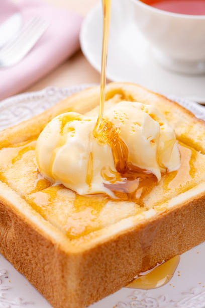 Drizzling Honey Over Honey Toast with Vanilla Ice Cream