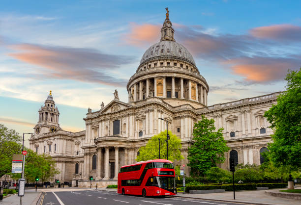 istock St. Paul's cathedral and double-decker bus at sunset, London, UK 2199301002