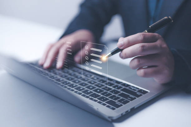 istock Digital Signature technology office. Businessman using pen to sign document, Show digital document virtual on laptop,Online business E-signing on network connection, digital document management 2199301254