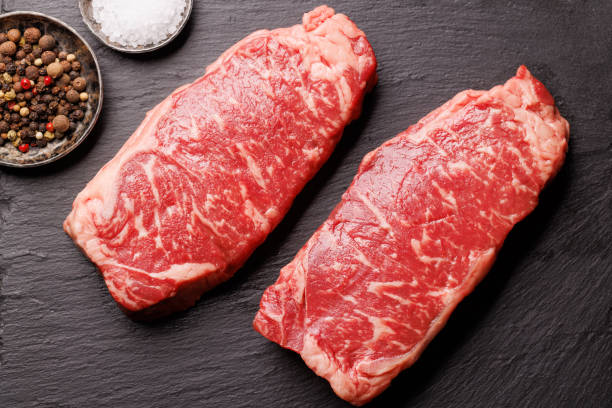 istock Raw marbled striploin steak, fresh, rich, ready for cooking 2199307286