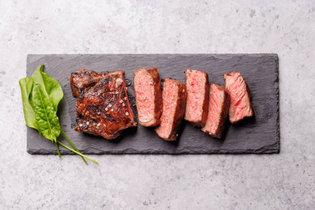 istock A perfectly cooked sliced striploin steak with a juicy, tender texture 2199307340