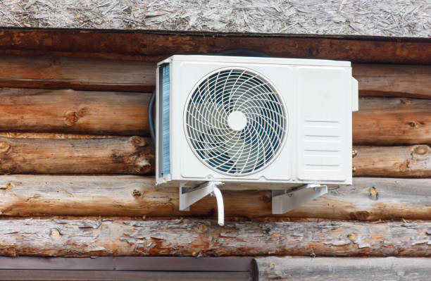istock A white air conditioner is mounted on a wooden wall 2199307792