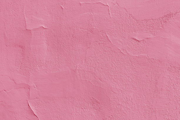 istock Texture of pink rough plaster. 2199313119