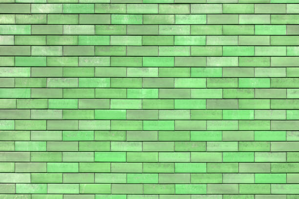 matte green painted brick wall full frame flat background and texture.