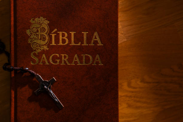 A close-up of a brown leather-bound Portuguese Holy Bible, \