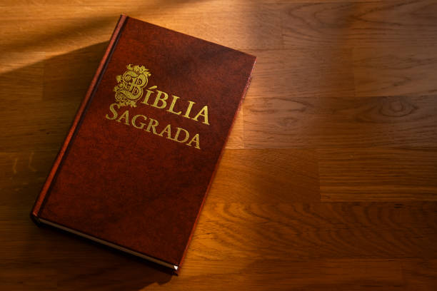 istock Portuguese Holy Bible on Wooden Table 2199315248