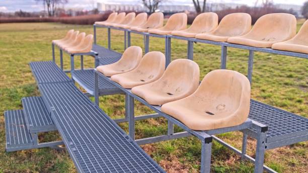 istock Portable Specator Seating Stand with Plastic Seats at Outdoor Athletic Stadium 2199317477