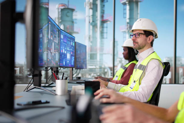istock Black Businessman and African Woman Using SCADA 2199318839