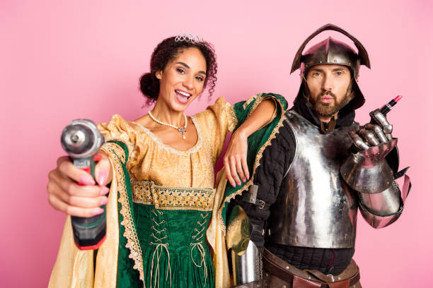 istock Humorous themed medieval costume with juxtaposition of modern tools and makeup 2199322722