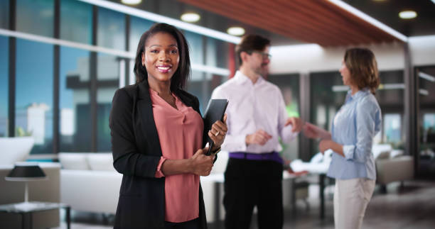 istock Hardworking Real Estate Agent Assisting Diverse Couple 2199327388