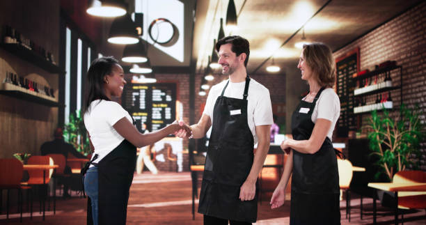 istock Multiracial team celebrates successful new chef 2199327514
