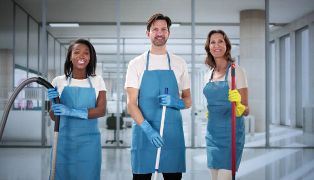 istock Hard-working cleaner team keeping offices spotless 2199327537