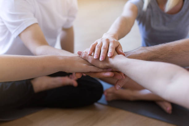istock Unity Concept. Group Of People Joining Hands Together, Unrecognizable Men And Women Stacking Palms, Expressing Support, Enjoying Teamwork, Cropped Image, Closeup 2199327728